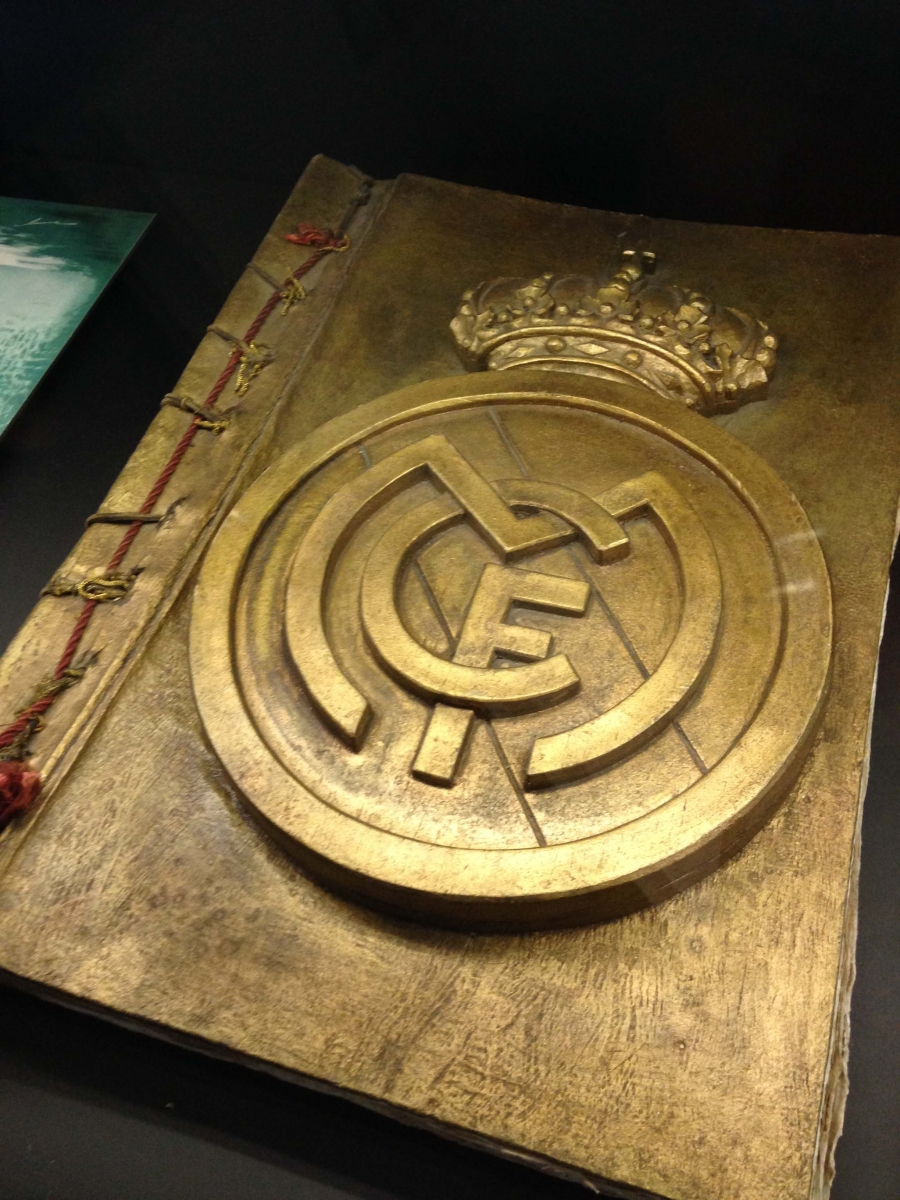 A book with a gold circular emblem